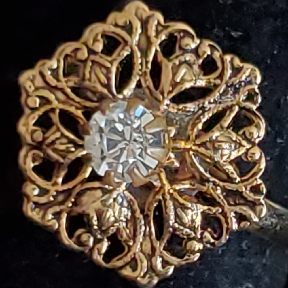 Goldtone filigree hexagon ring with clear rhinestone adjustable